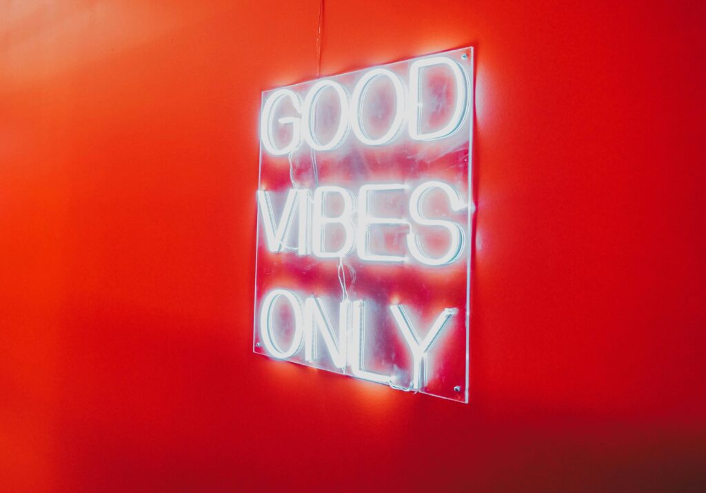 Photo by Victor Dunn: https://www.pexels.com/photo/a-neon-sign-on-a-red-wall-11587156/