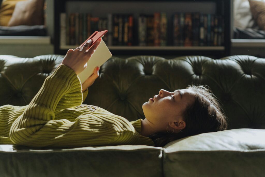 Photo by cottonbro studio: https://www.pexels.com/photo/woman-in-yellow-long-sleeve-shirt-lying-on-couch-4866043/