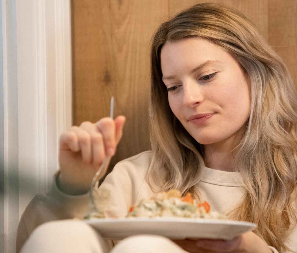 Photo by Kevin Malik: https://www.pexels.com/photo/a-woman-holding-white-ceramic-plate-with-food-9032663/