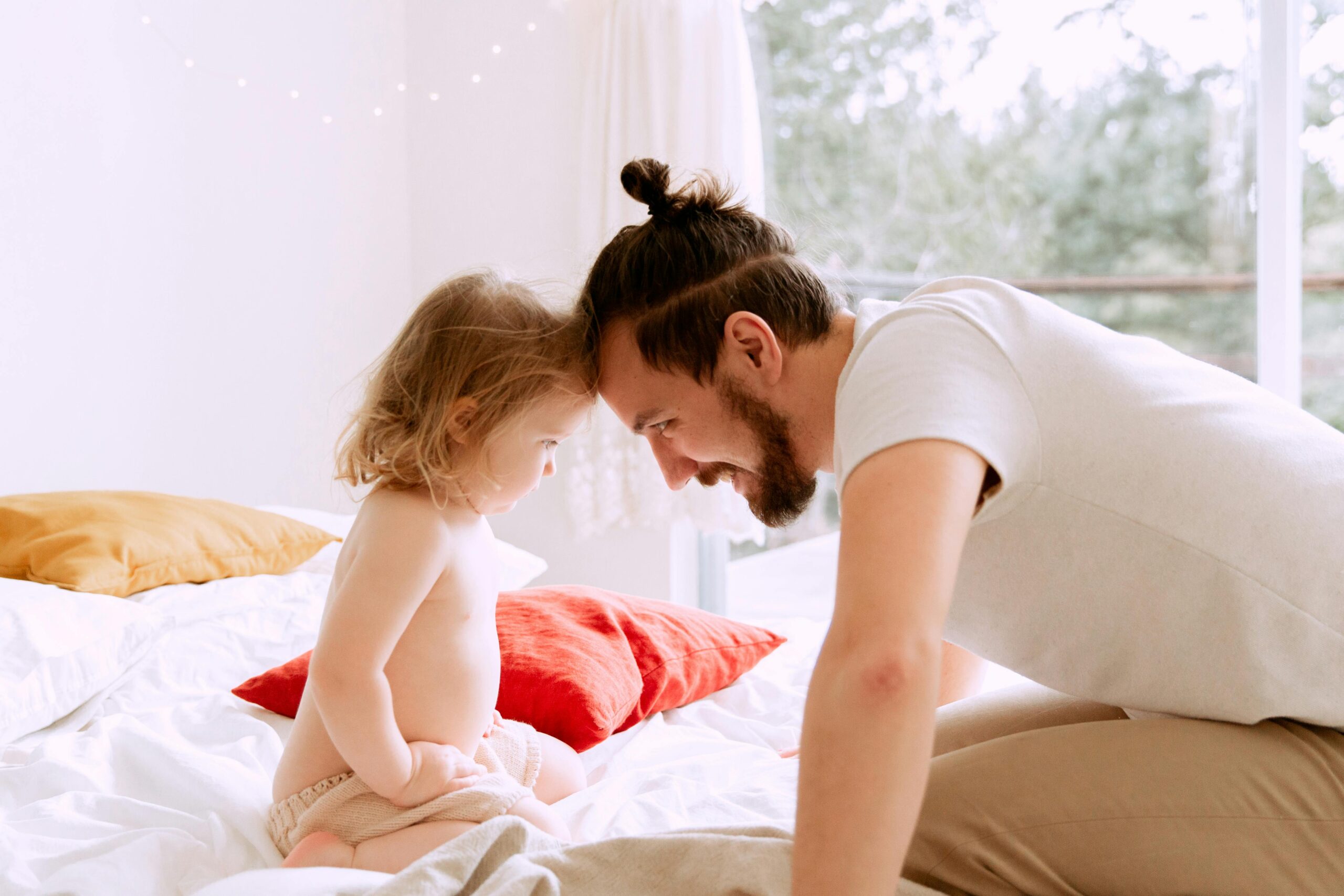 Photo by Tatiana Syrikova: https://www.pexels.com/photo/photo-of-man-leaning-his-forehead-on-child-s-forehead-3933076/